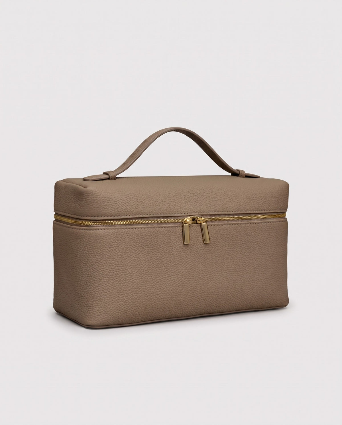 Orvieto pebbled leather vanity case in Taupe – three-quarter view