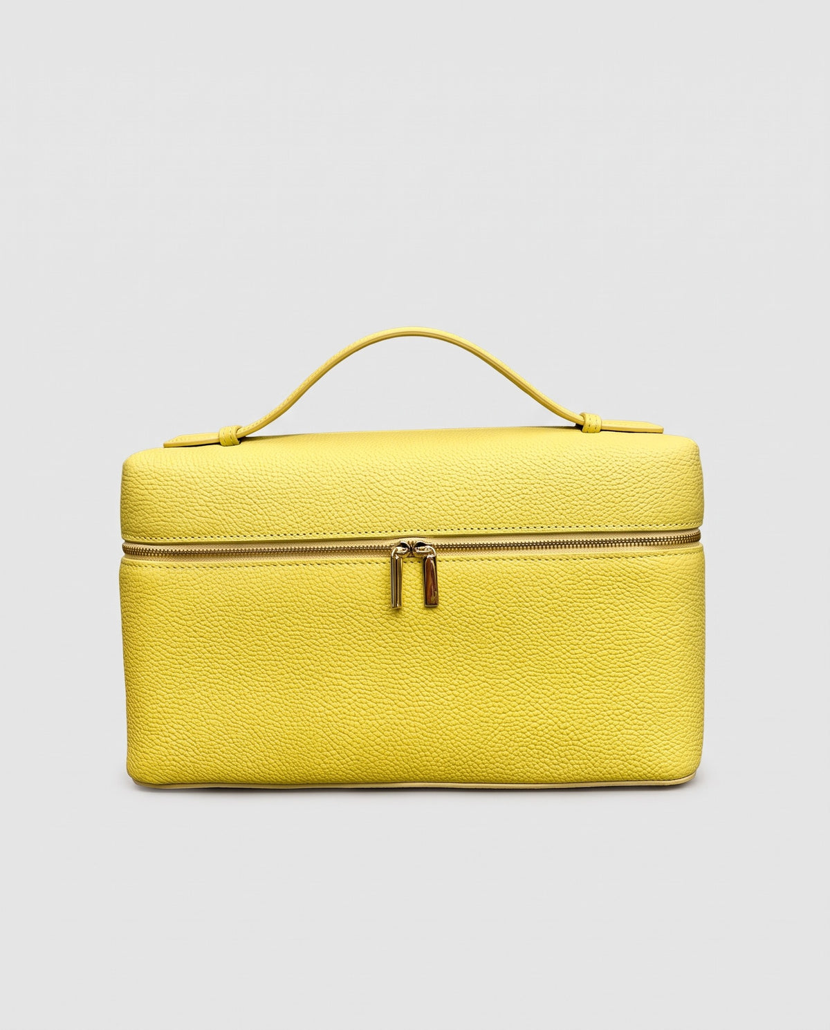 Orvieto pebbled leather vanity case in Yellow – front view