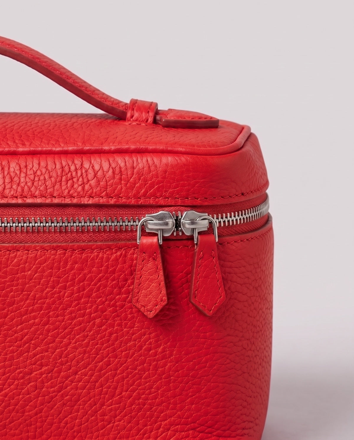 Pebbled leather close-up of the Valentina Orvieto Small bag in Red