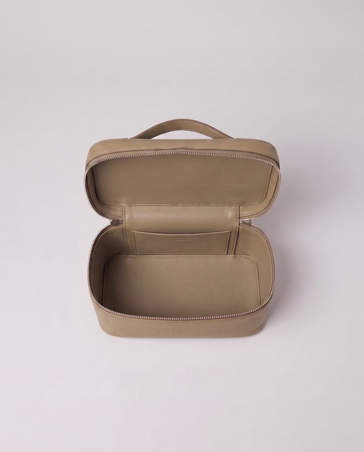 Inside the Valentina Orvieto Small top-handle bag in Stone leather