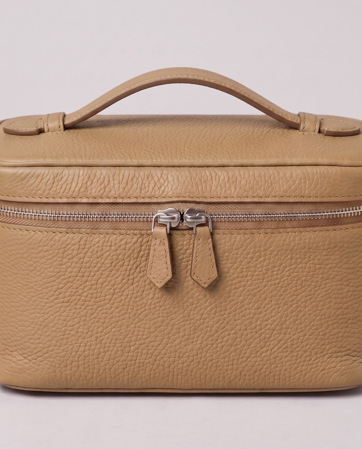 Silver zip and handle detail on the Valentina Orvieto Small bag in Stone leather