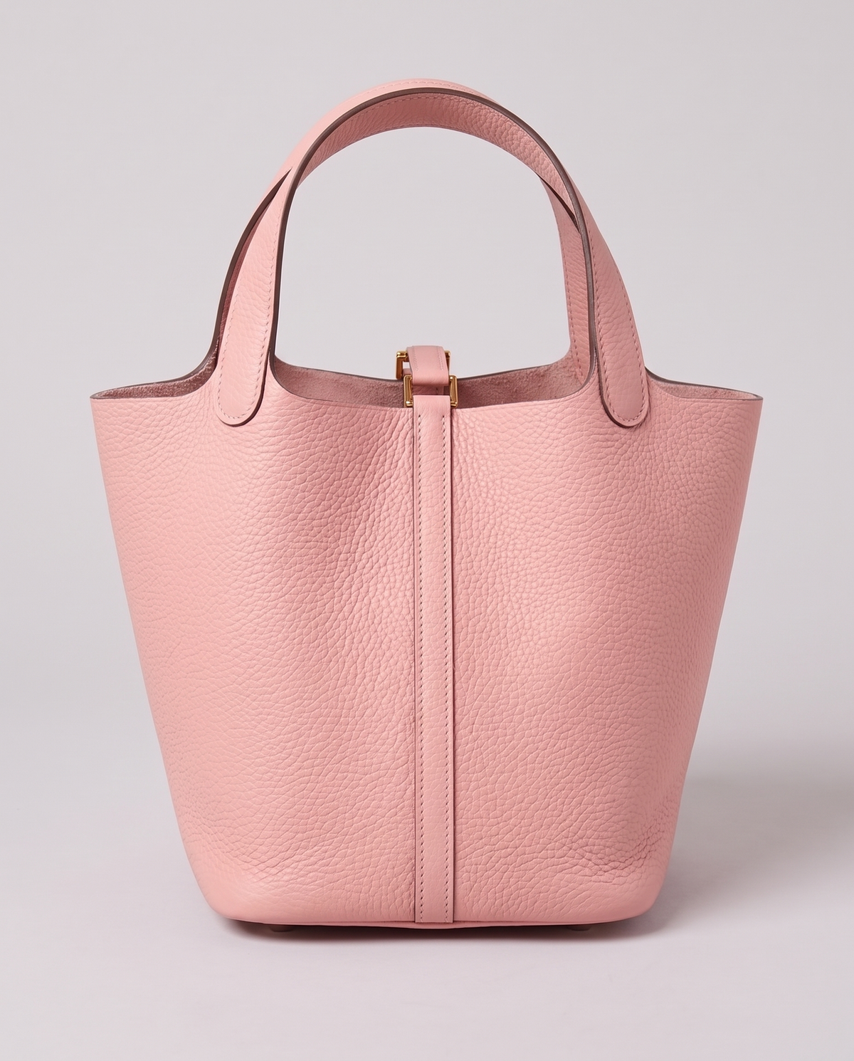 Hardware and handle detail on the Valentina Ostuni Large bag in Blush