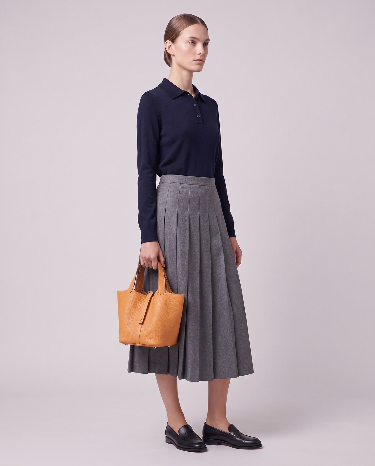 Model carrying the Valentina Ostuni Small bag in Apricot