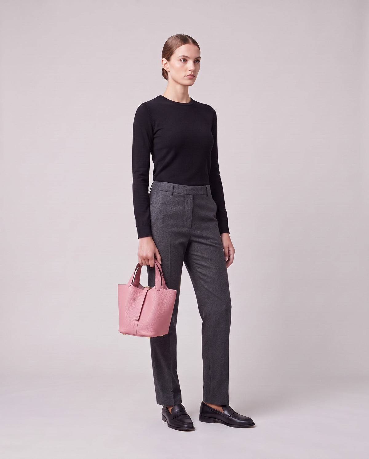 Model holding the Valentina Ostuni Small bag in Rose, full length