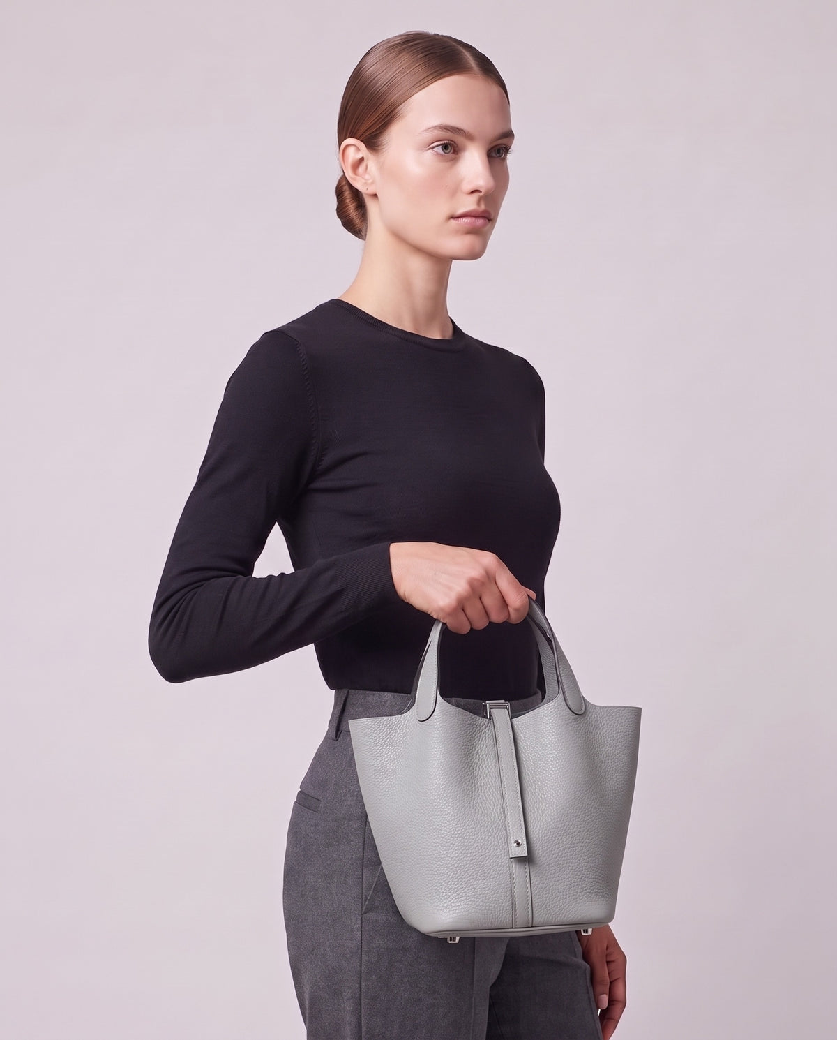 Model carrying the Valentina Ostuni Small bag in Silver