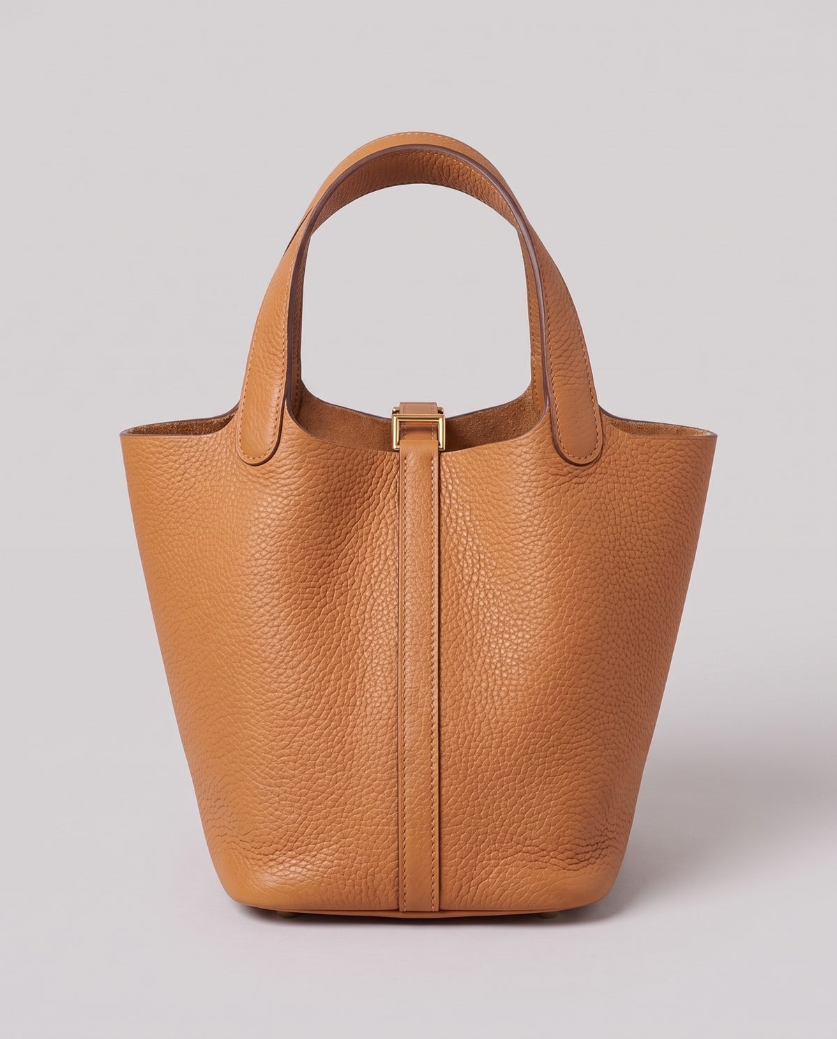 Hardware and handle detail on the Valentina Ostuni Small bag in Tan