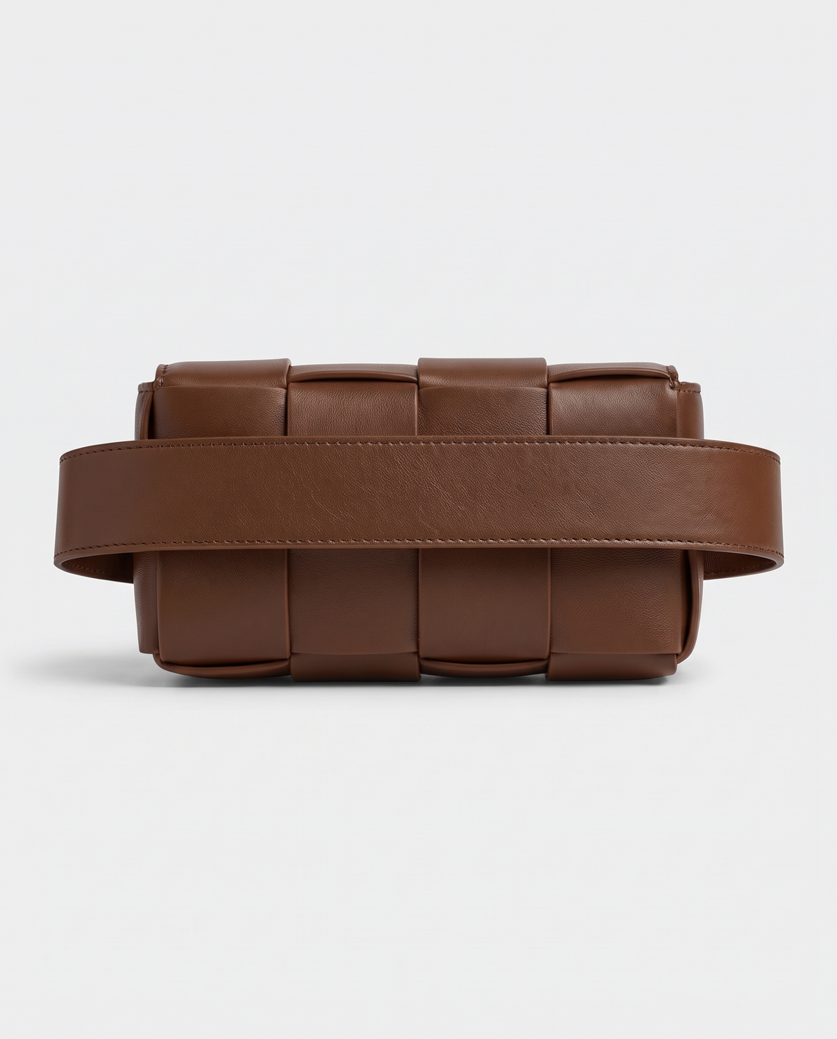 Cassette padded woven leather belt bag in Brown – back view showing the belt strap