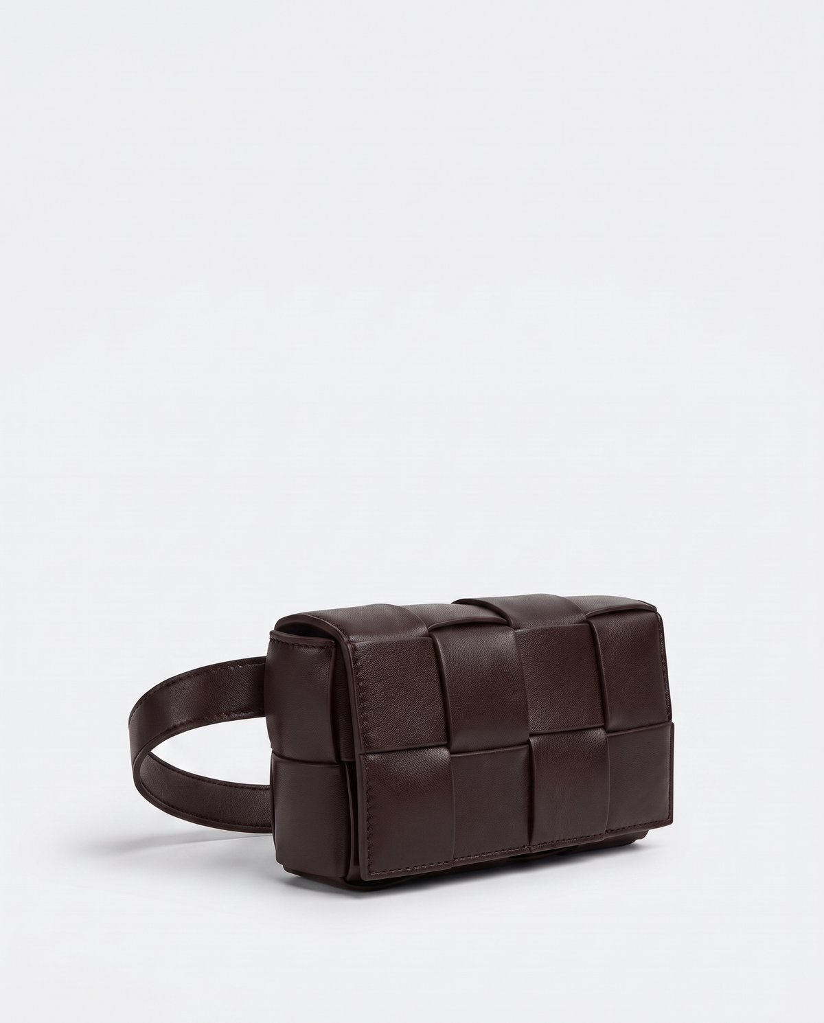 Cassette padded woven leather belt bag in Espresso – three-quarter view