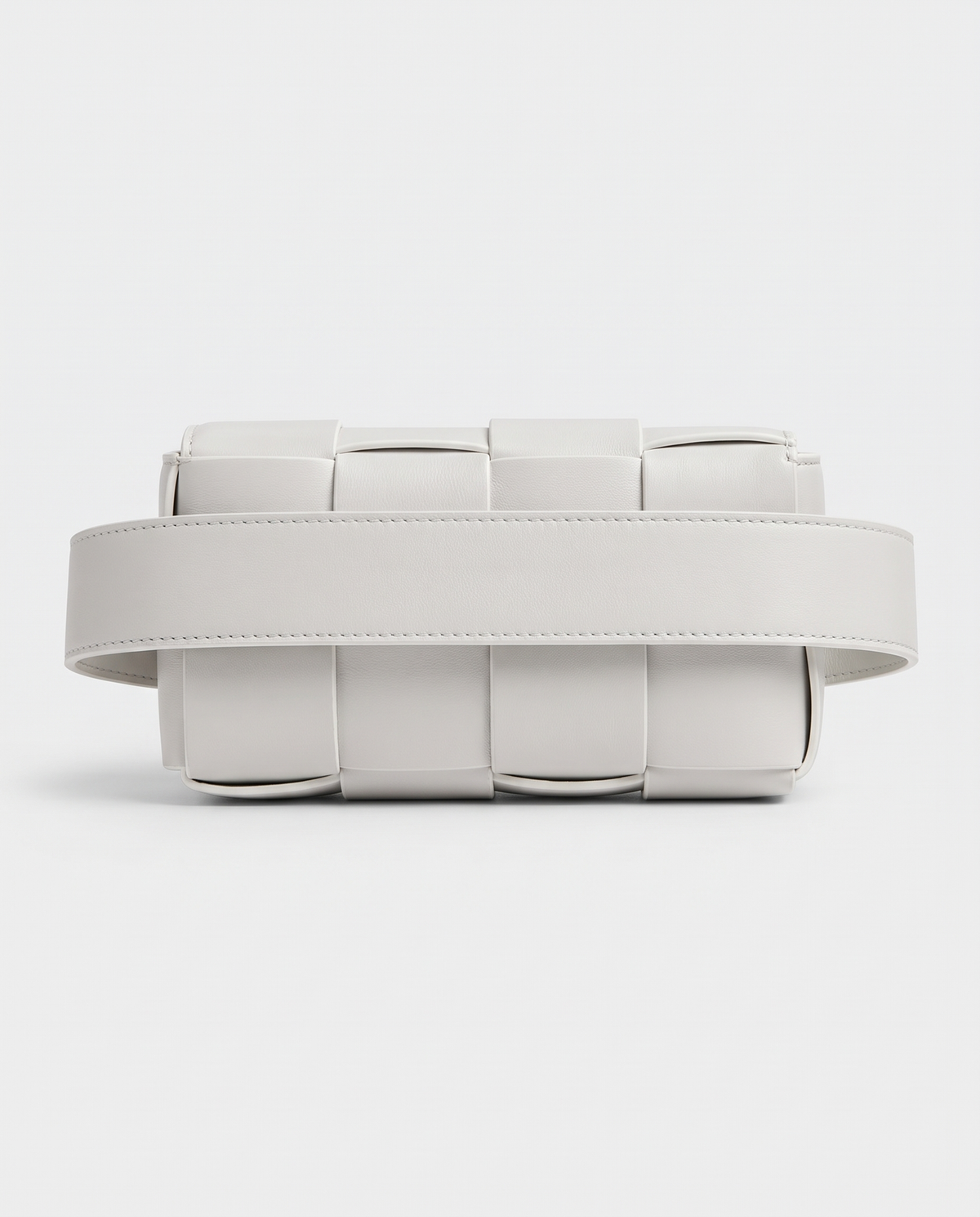 Cassette padded woven leather belt bag in Ivory – back view showing the belt strap