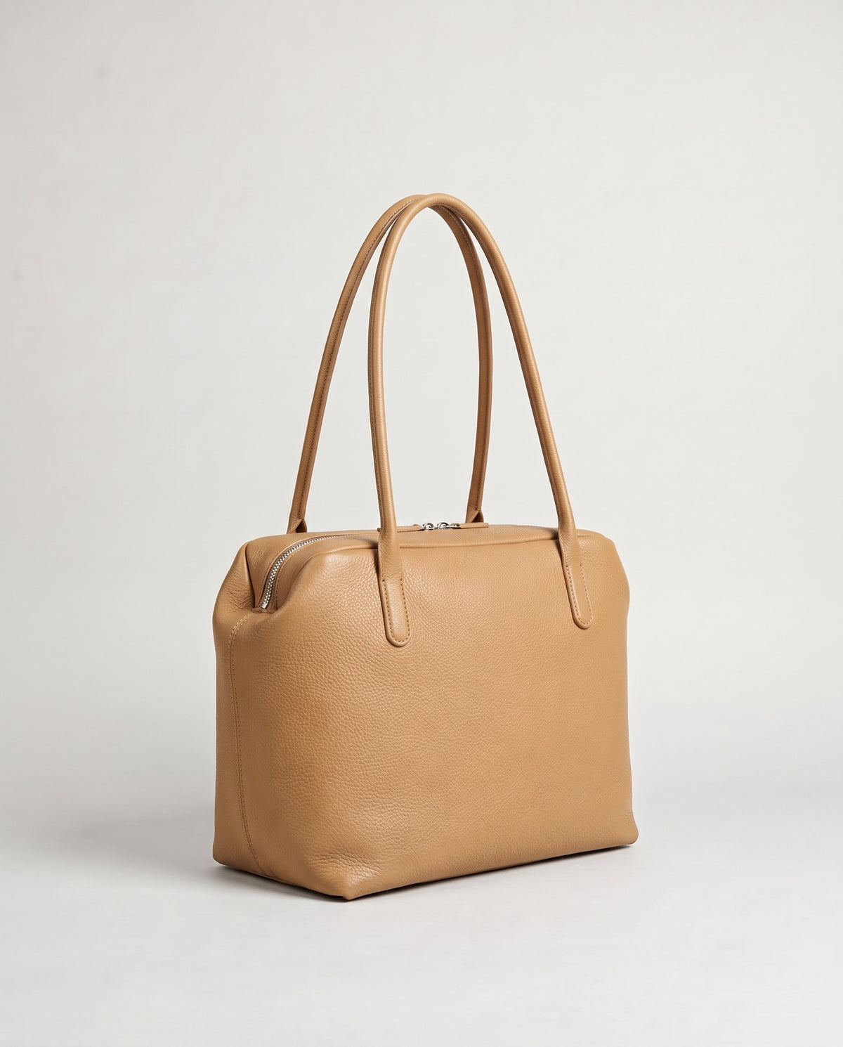 Pavia leather tote in Camel – three-quarter view