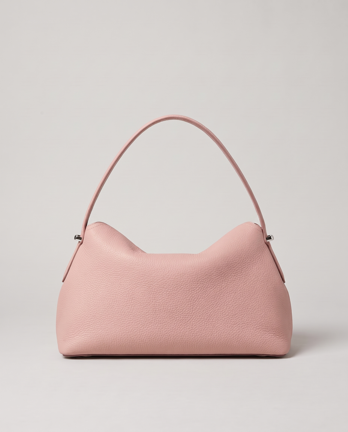 Porto pebbled leather top-handle bag in blush, back view