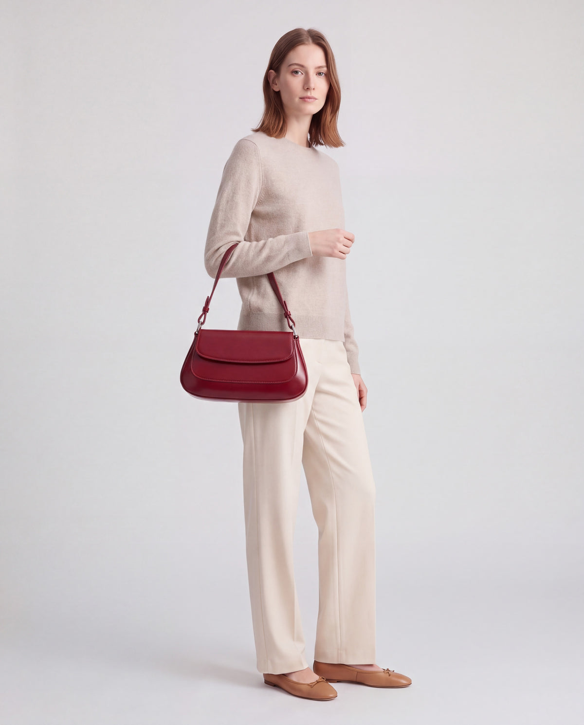 Rue bag in Red – carried by model, close-up