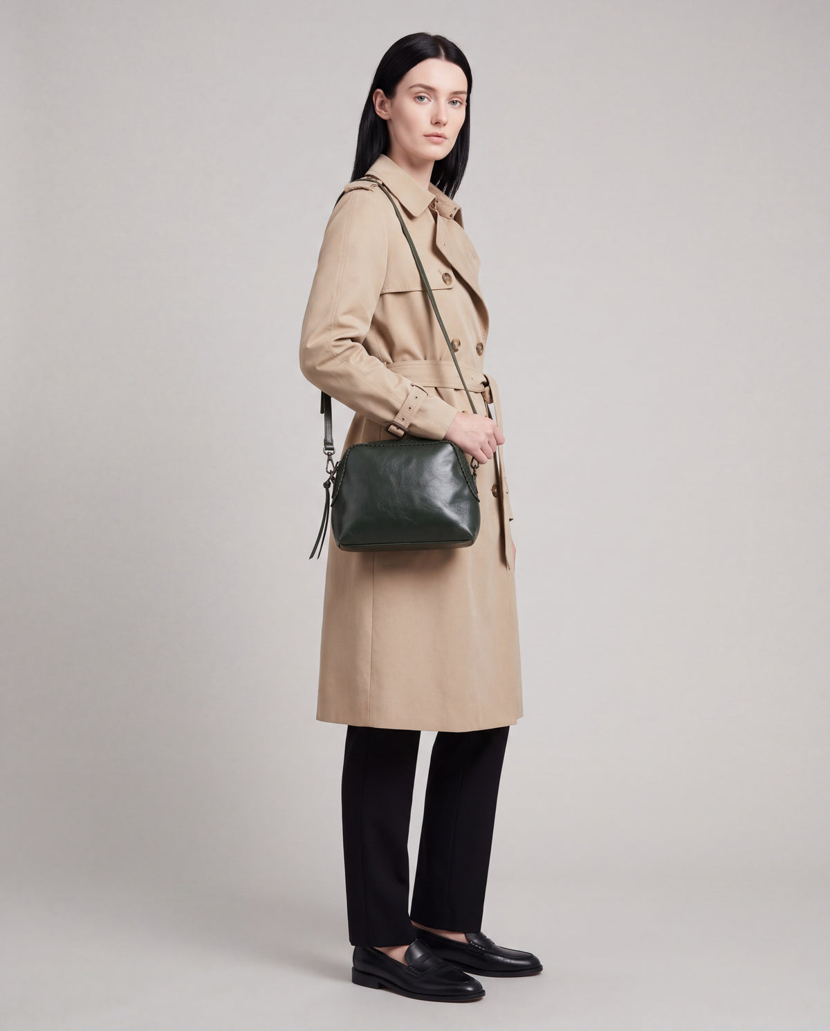 Shell bag in Green – worn by model, full length