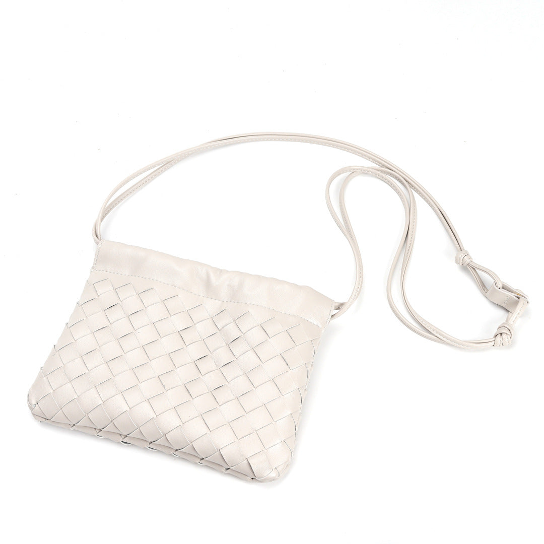 Slim Clutch (Andiamo) genuine leather woven crossbody bag in ivory white - front view