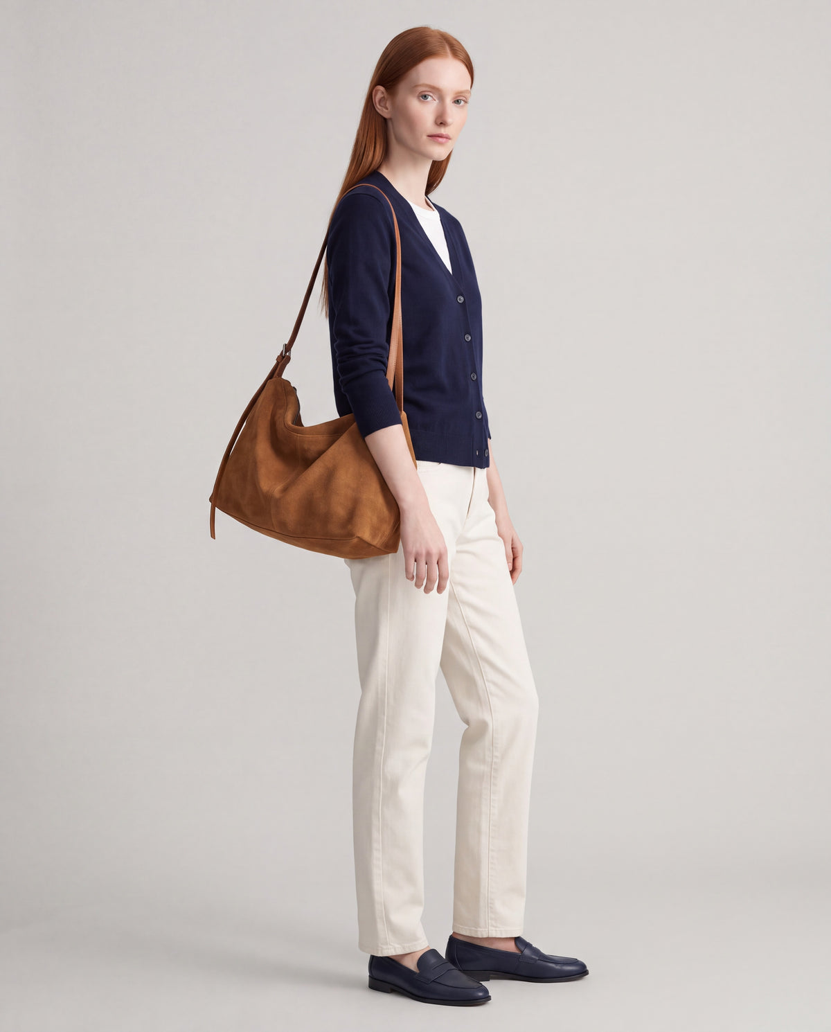 Slouch bag in Camel – worn by model, full length