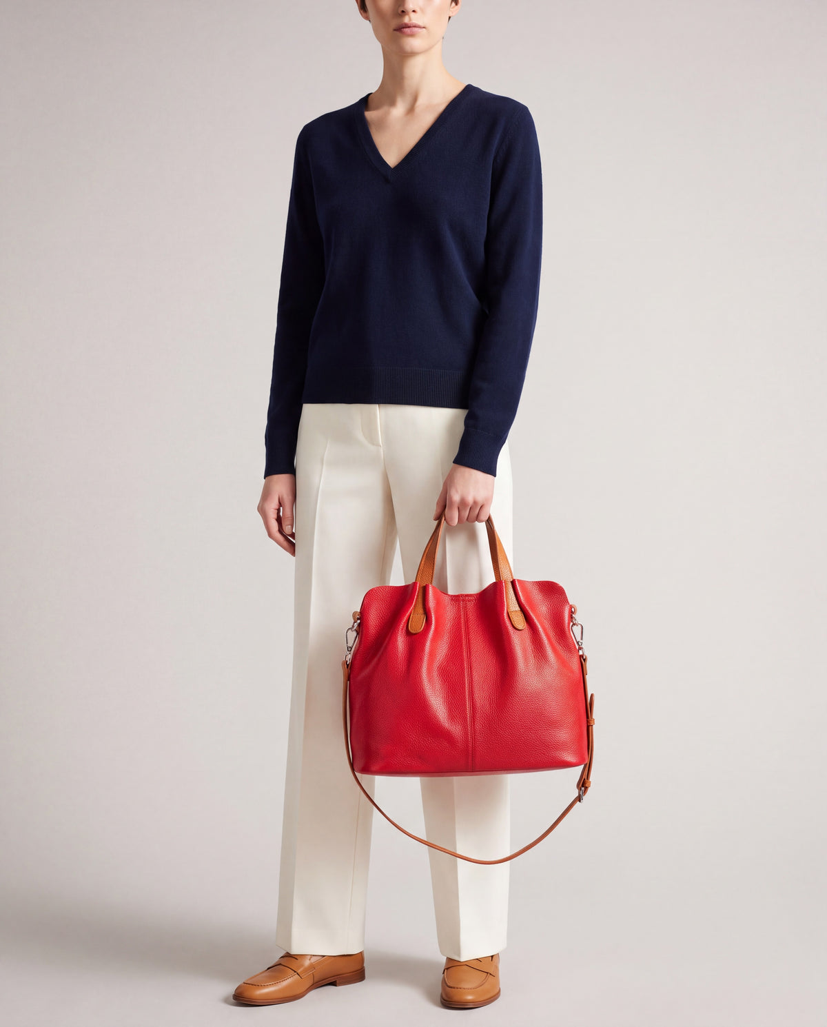 Soft Leather Tote Bag bag in Red – worn by model, close-up