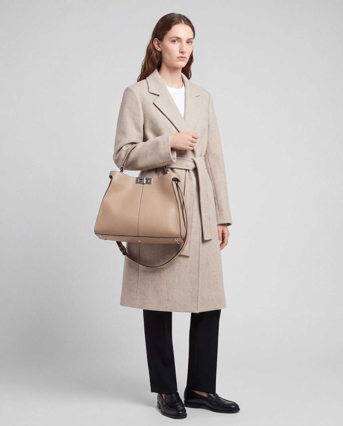 Sola bag in Beige – worn by model, close-up