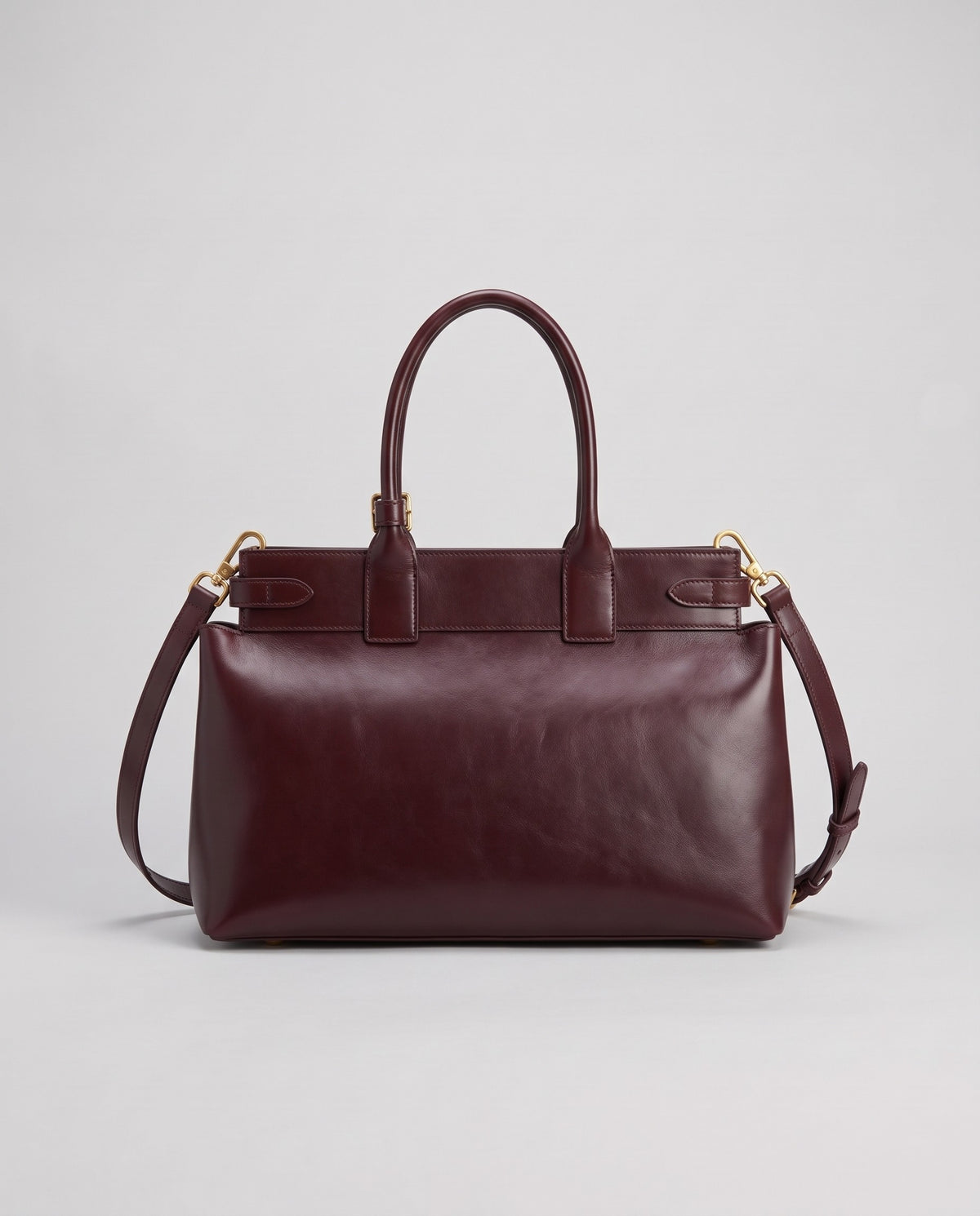 Spello cowhide leather top-handle bag in Burgundy – back view