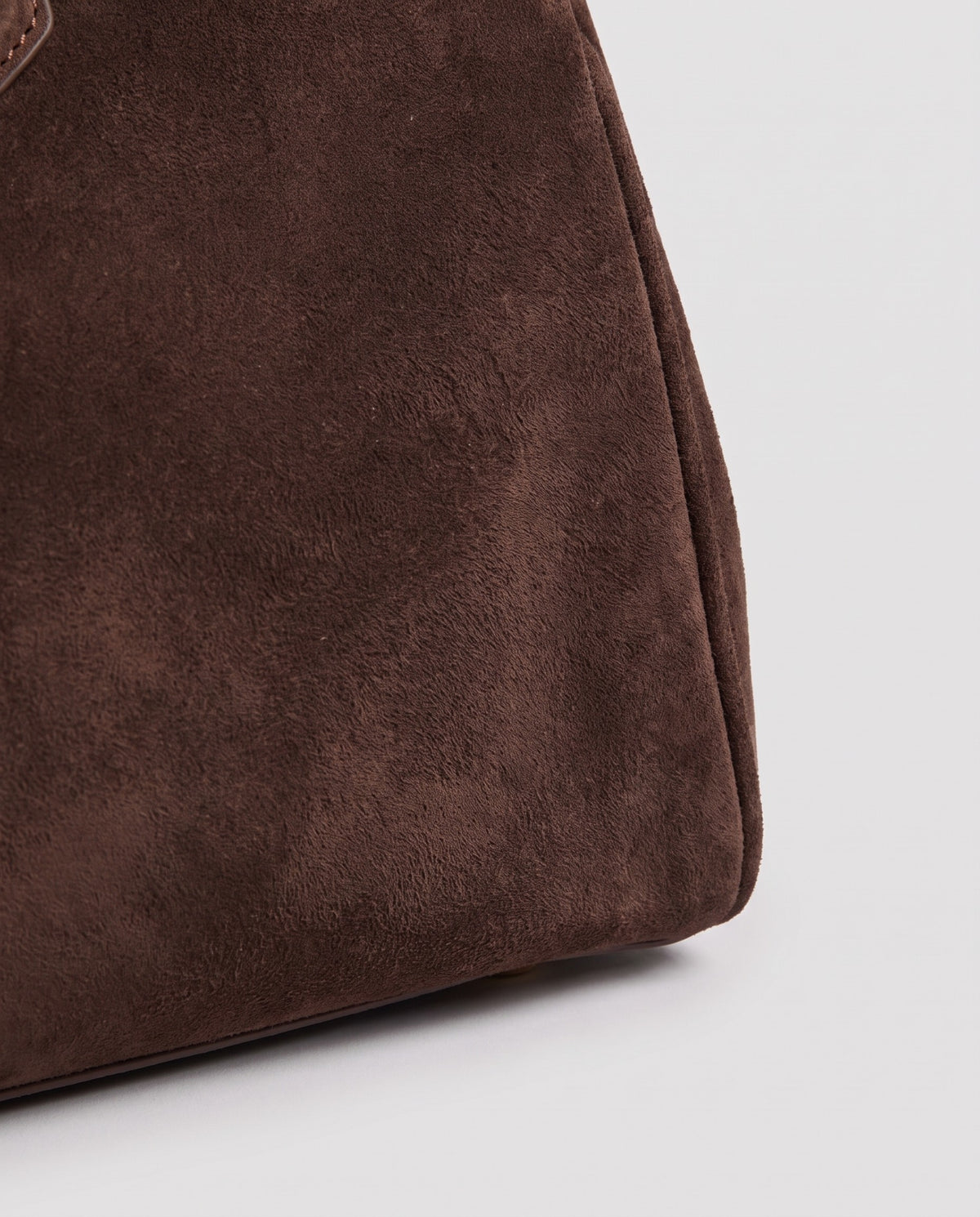 Close-up of the brushed suede on the Spello bag in Chocolate