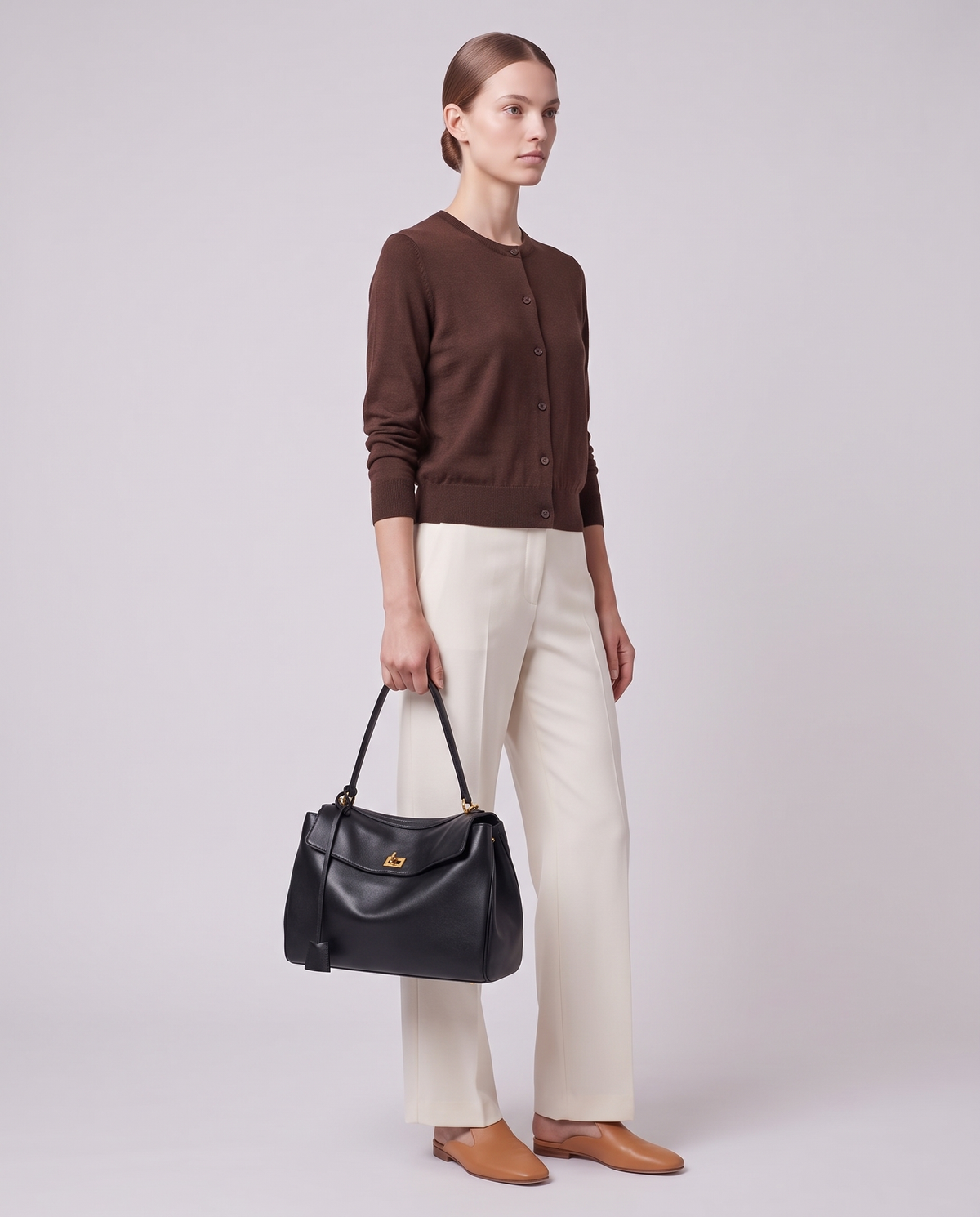 Model carrying the Valentina Tinto Large bag in Black