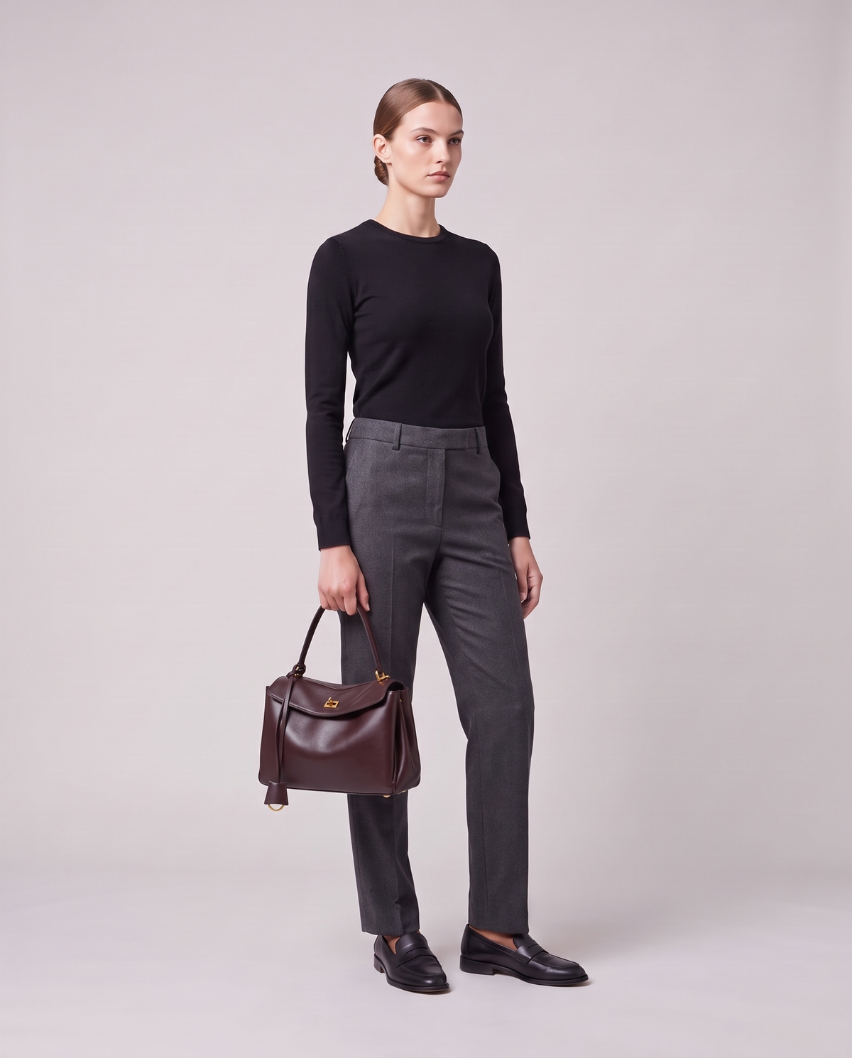 Model holding the Valentina Tinto Small bag in Mahogany, full length
