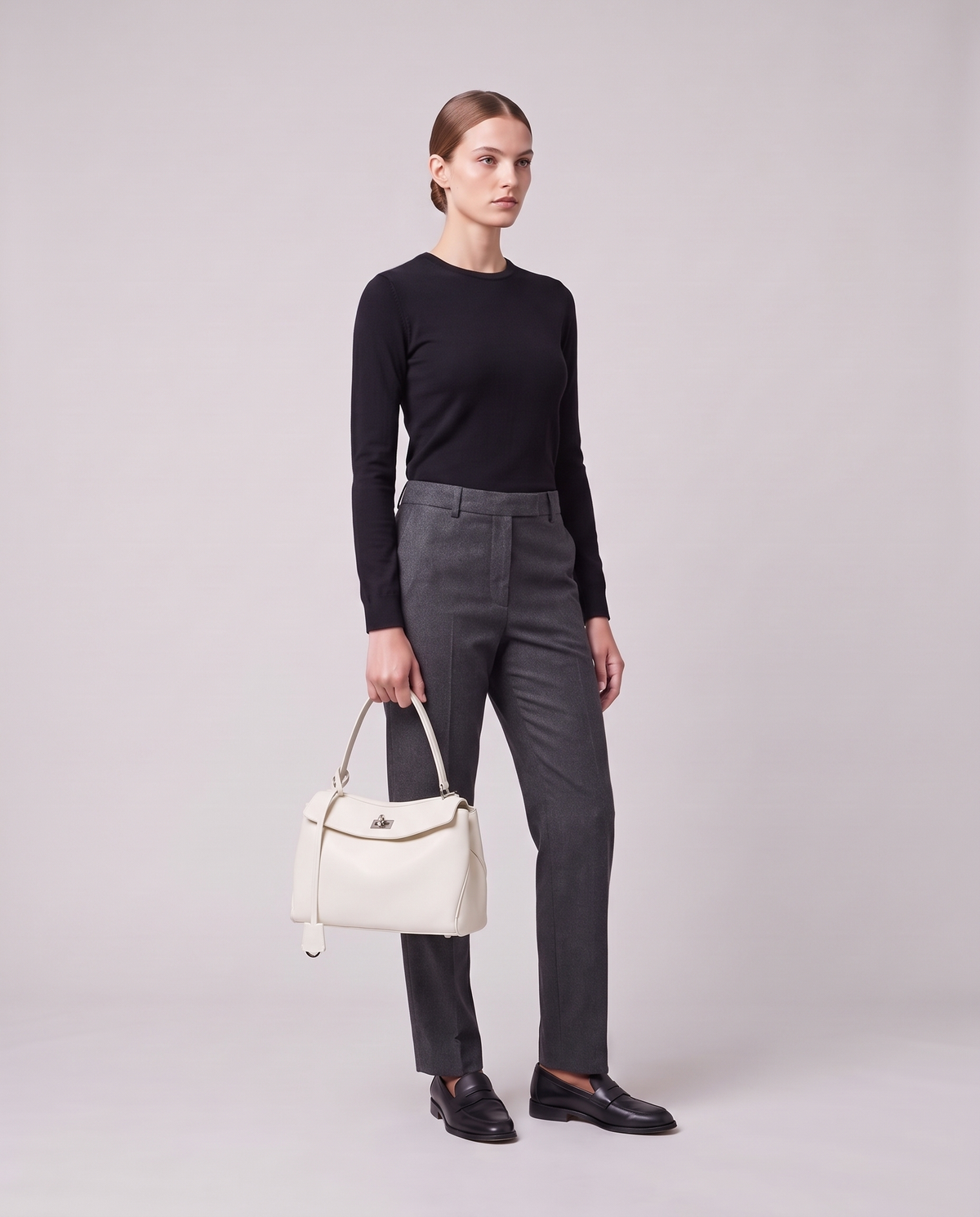 Model holding the Valentina Tinto Small bag in White, full length