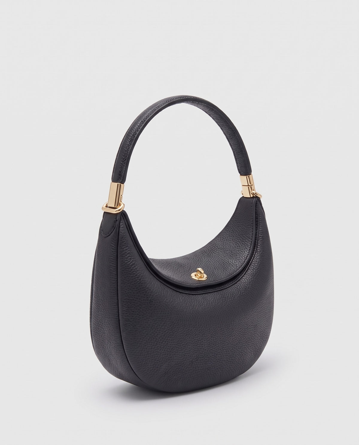 Todi pebbled leather crescent bag in Black – three-quarter view