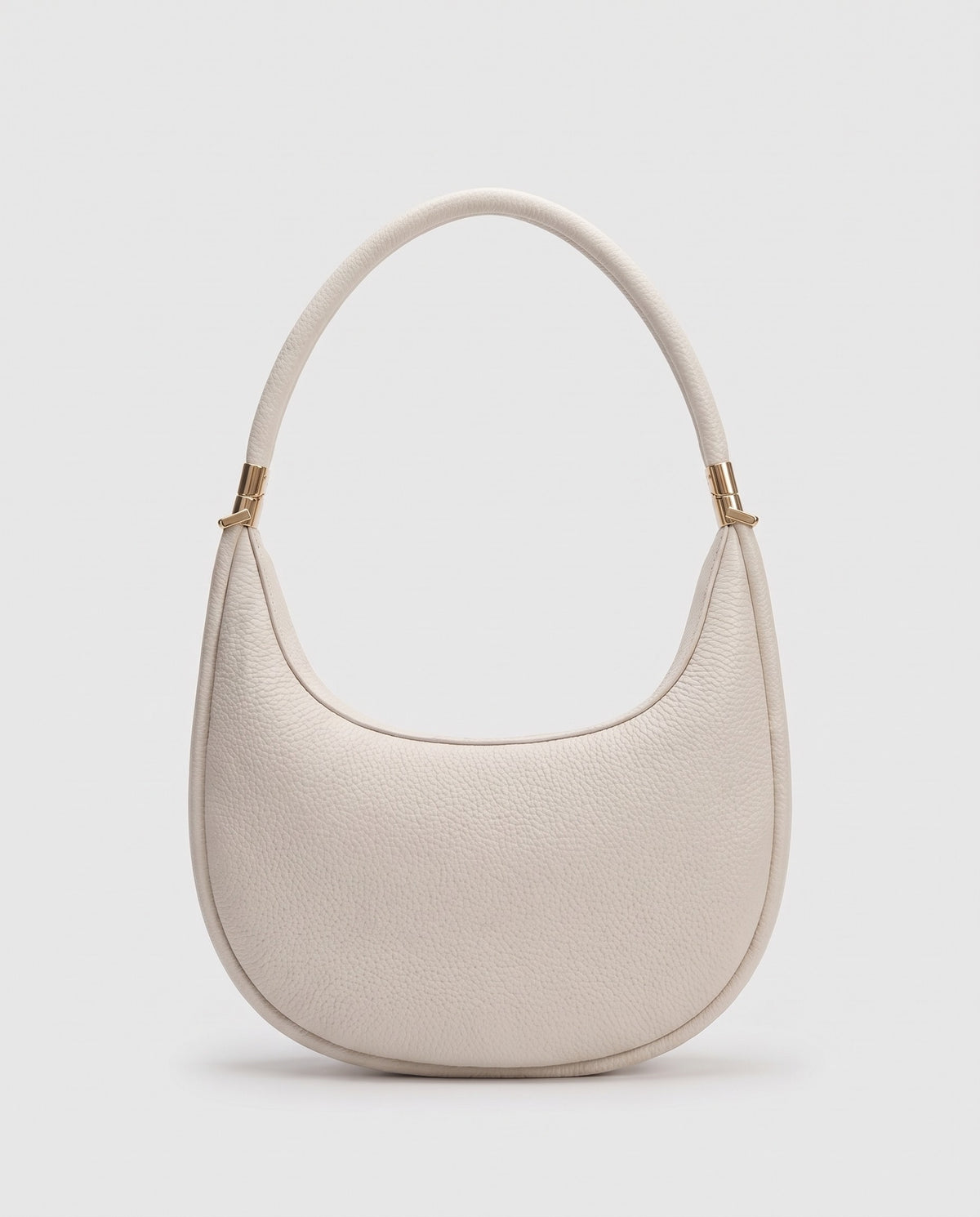 Todi pebbled leather crescent bag in Ivory – back view