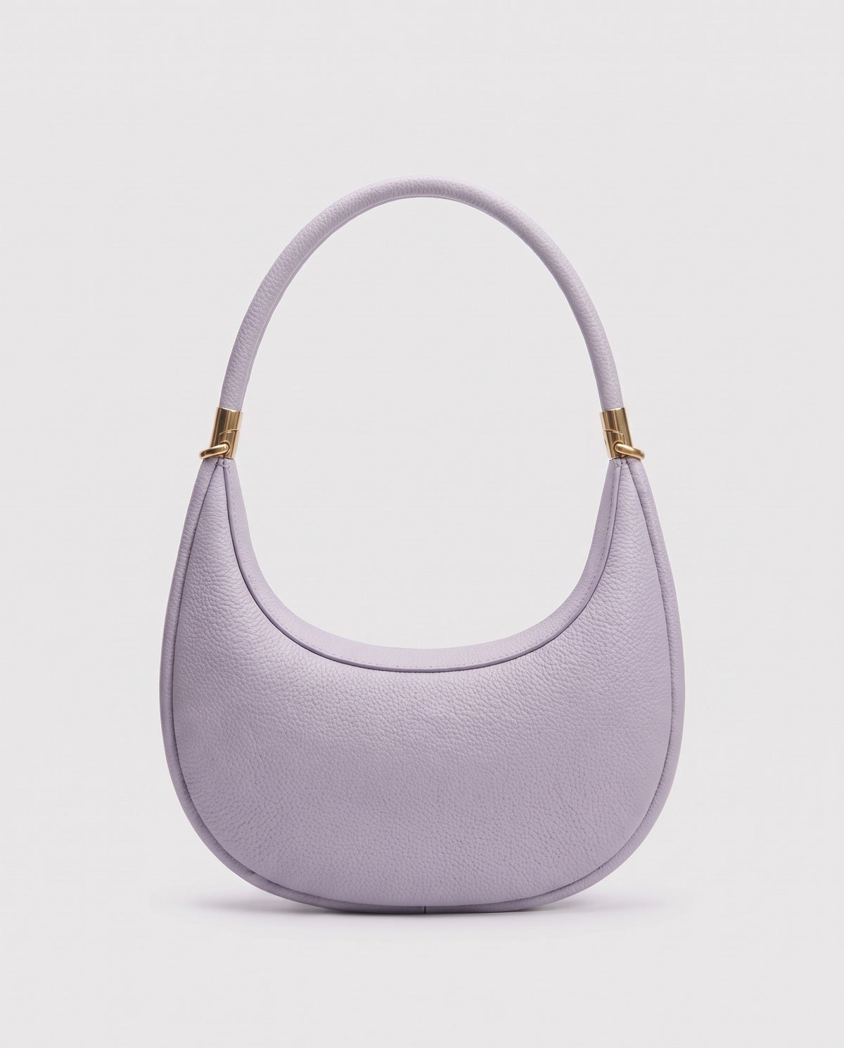 Todi pebbled leather crescent bag in Lavender – back view