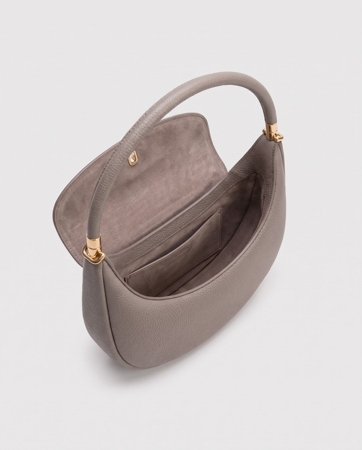 Inside view of the Todi crescent bag in Taupe