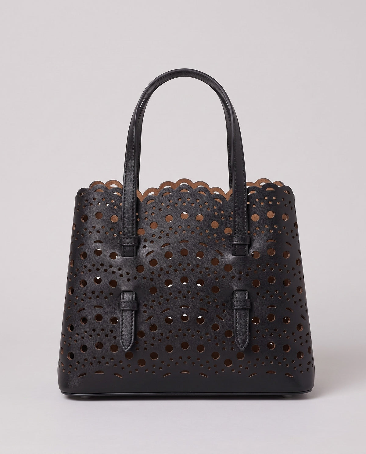 Hardware and handle detail on the Valentina Urbino Small bag in Black