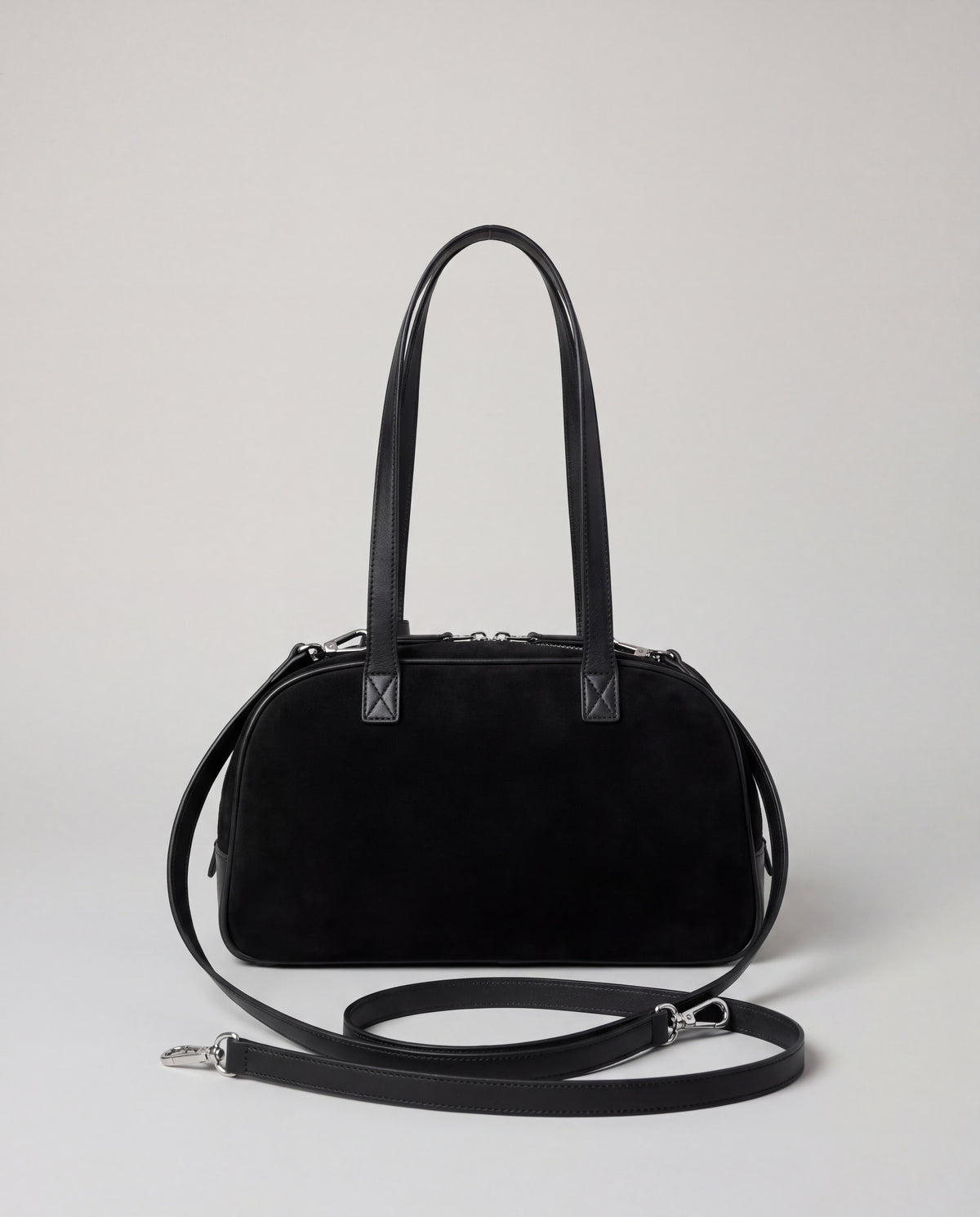 Back of the Valentina Linea suede bag in Black with its detachable long strap
