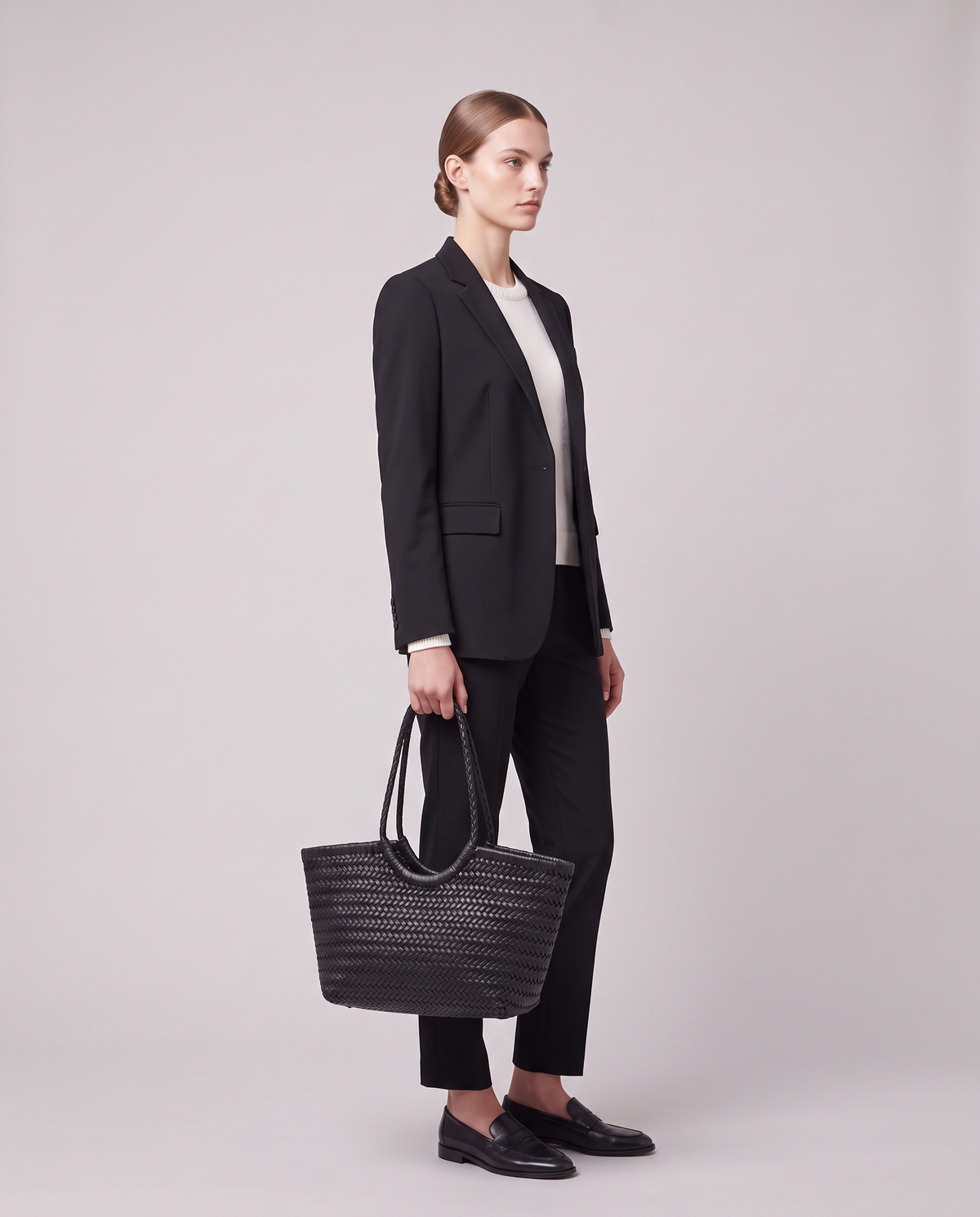 Model carrying the Valentina Matera Small bag in Black