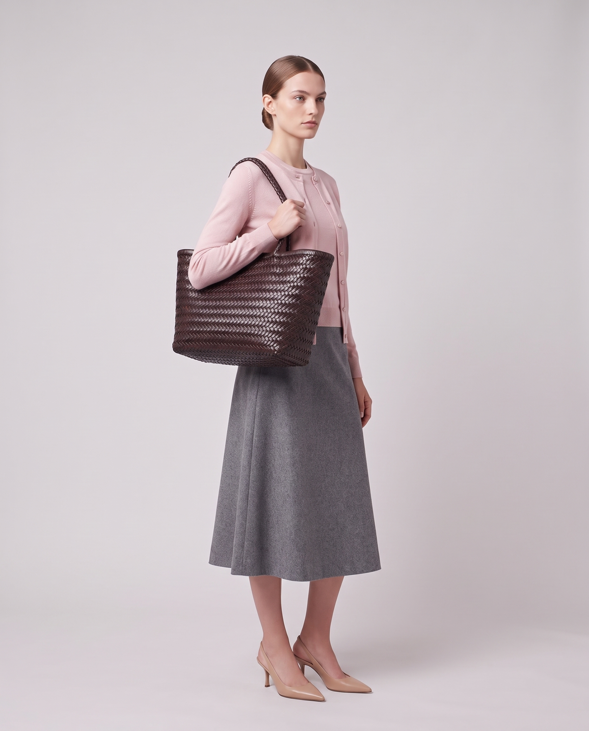 Model carrying the Valentina Noto Large bag in Espresso