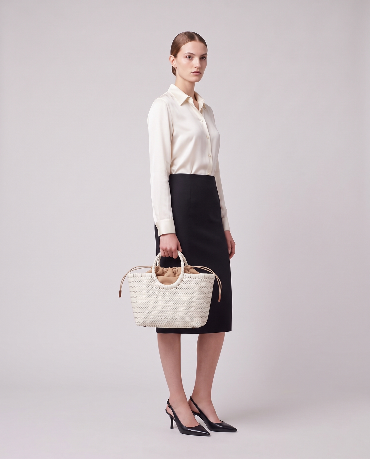 Model carrying the Valentina Noto Large bag in White