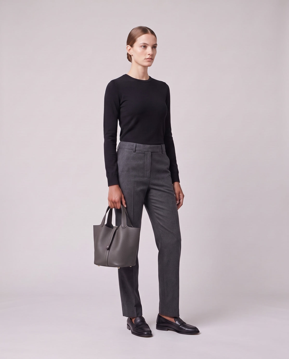 Model holding the Valentina Ostuni Small bag in Grey, full length