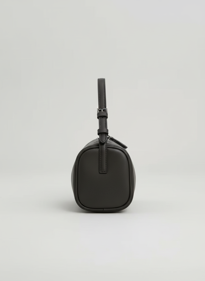 Valentina Roma barrel bag in charcoal leather, side view