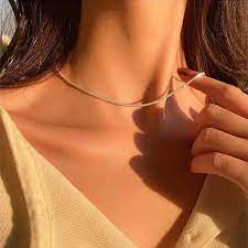 Model wearing tennis choker necklace