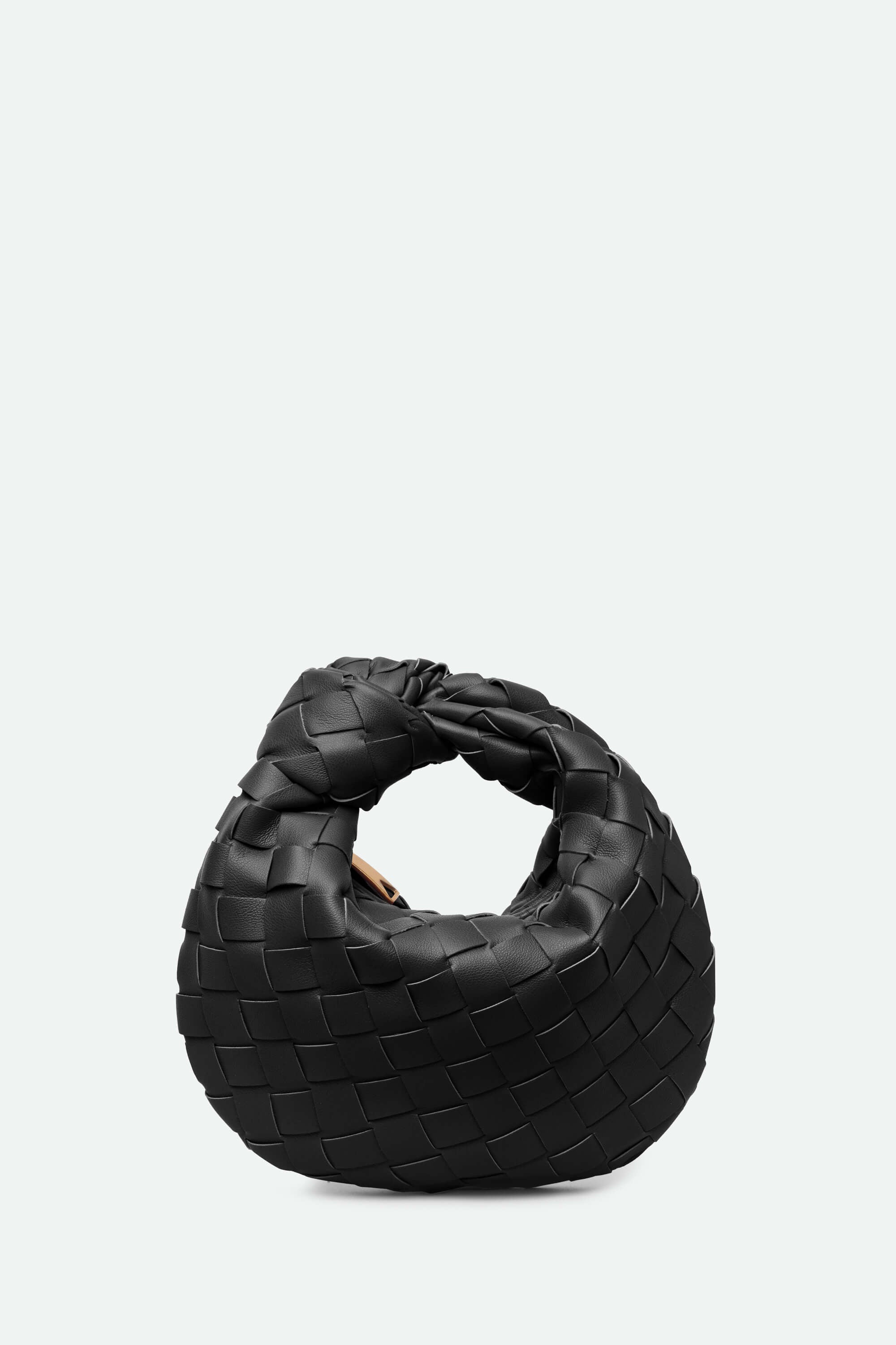 Small black VALENTINA handbag on grey background