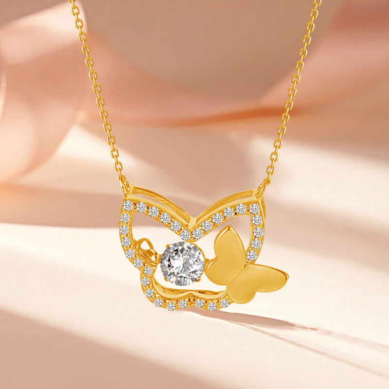 Gold chain necklace with butterfly pendant