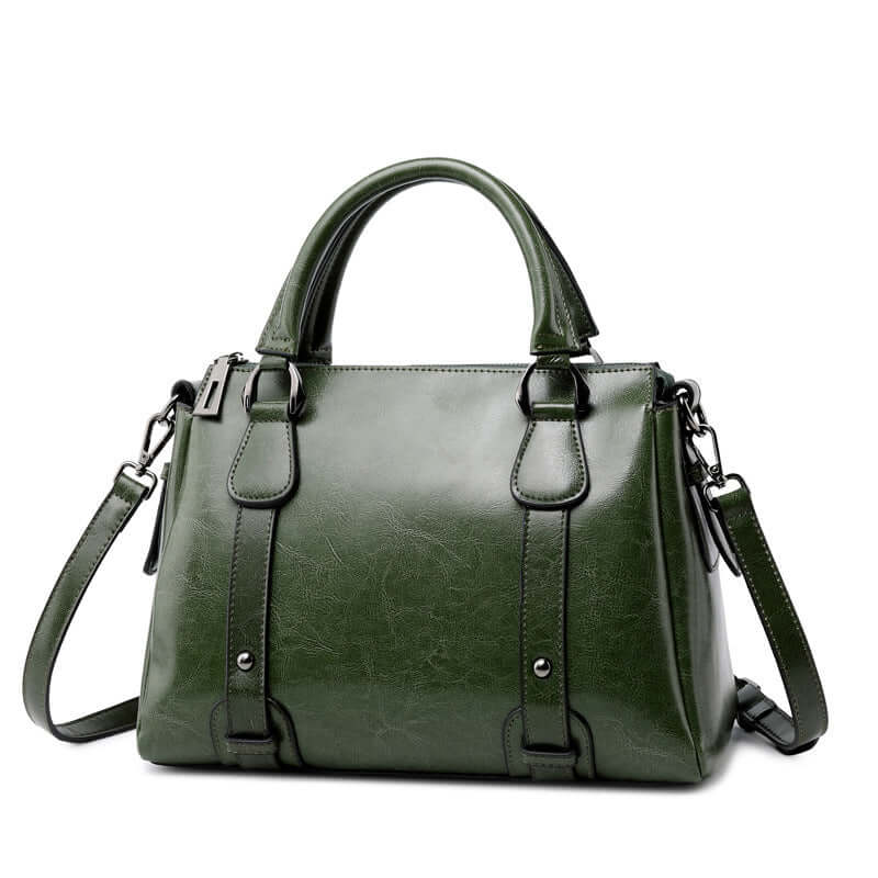 A green color leather handbag