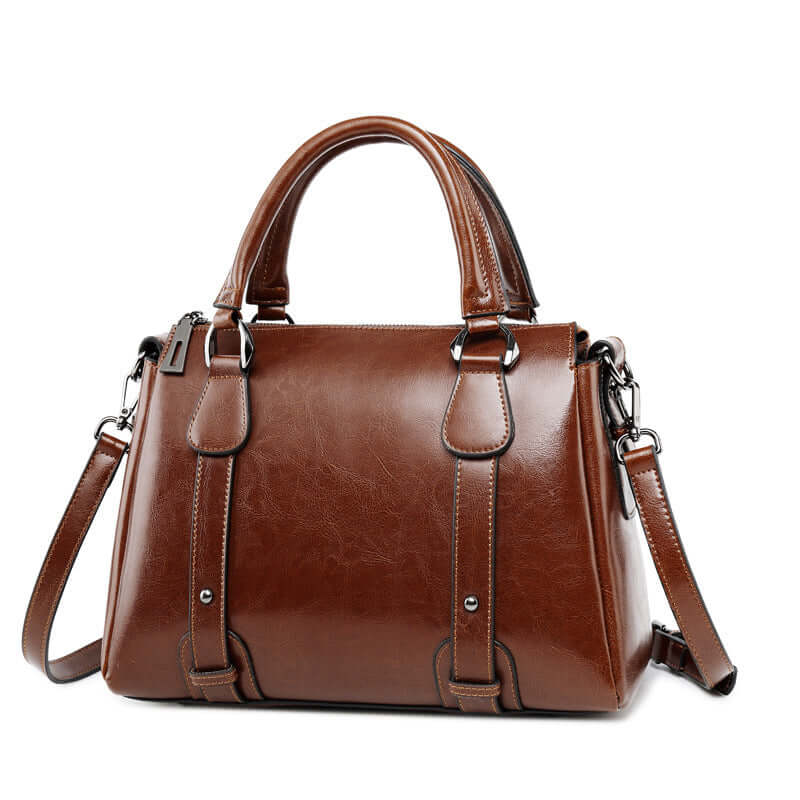 A brown color leather handbag