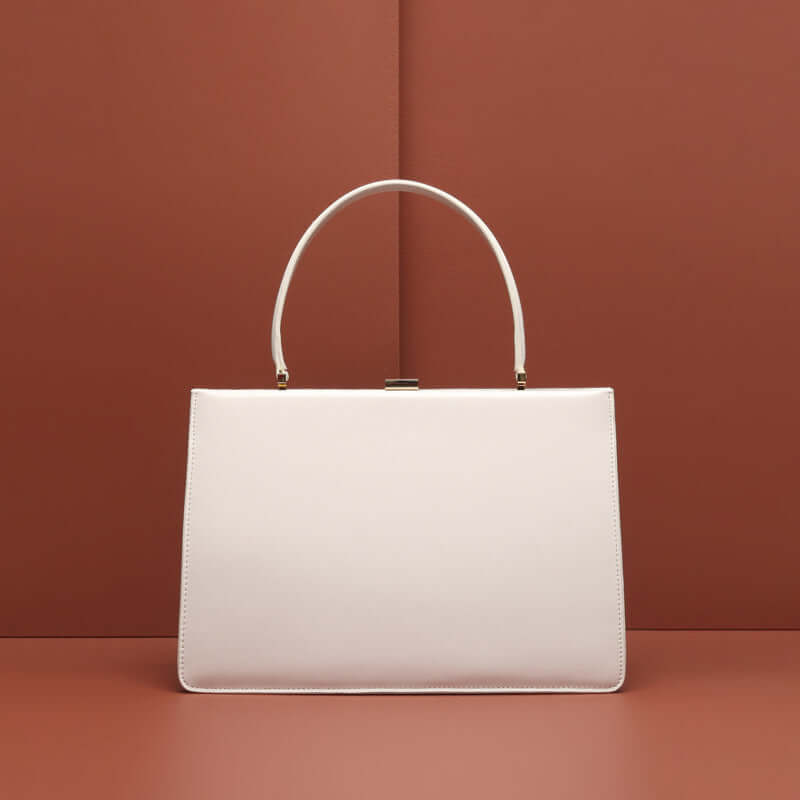 White vintage leather handbag