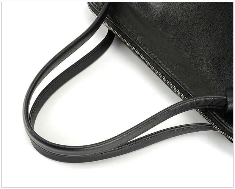 A black leather tote bag