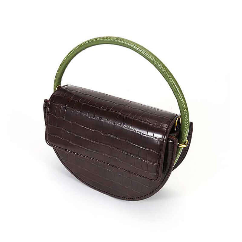 A round coffee colored leather bag