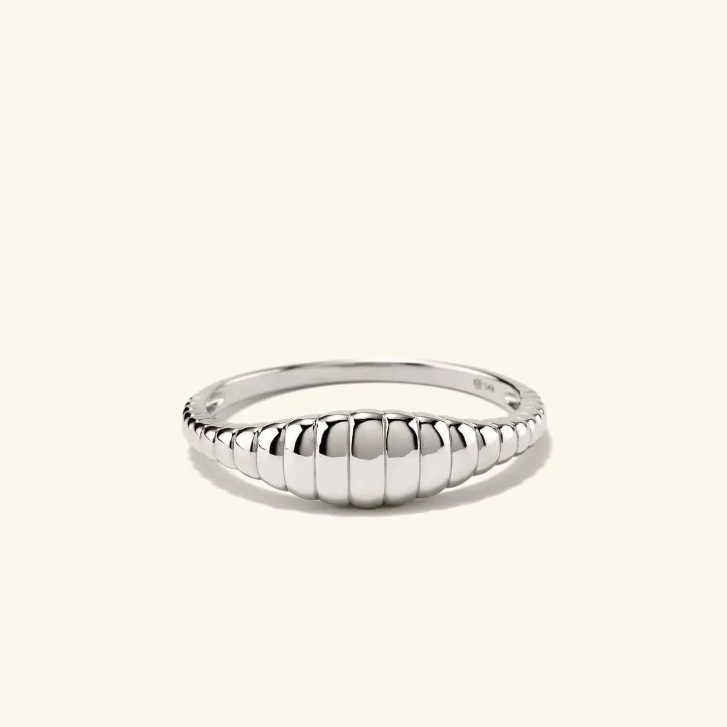 Croissant shaped ring in silver color