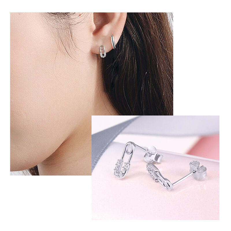 Model wearing silver Safety Pin Stud Earrings