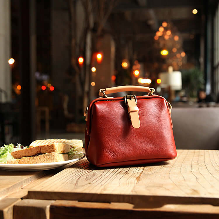 Wine red leather handbag