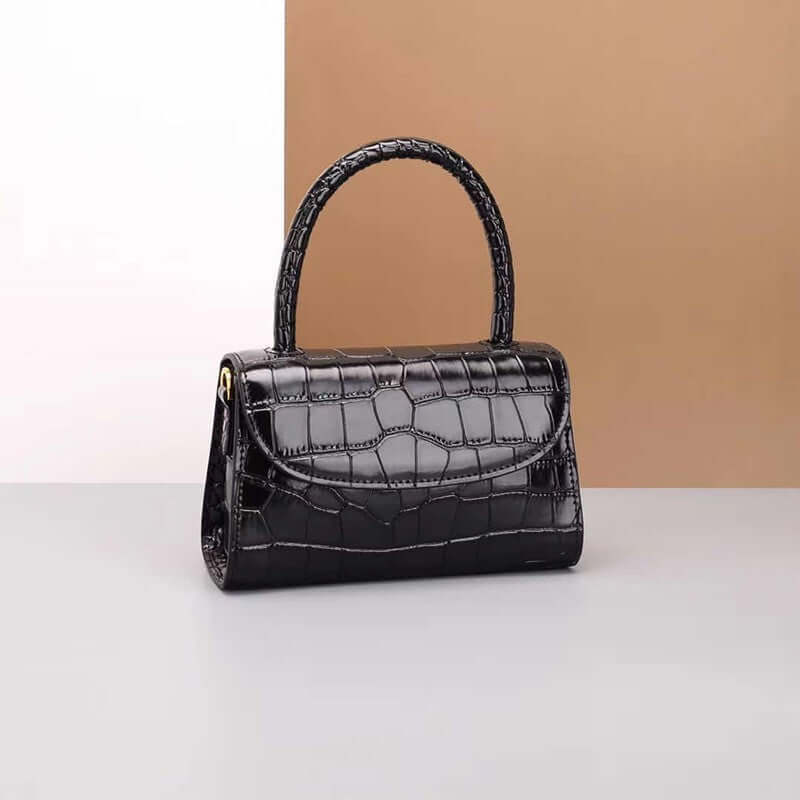 A black mini crossbody bag