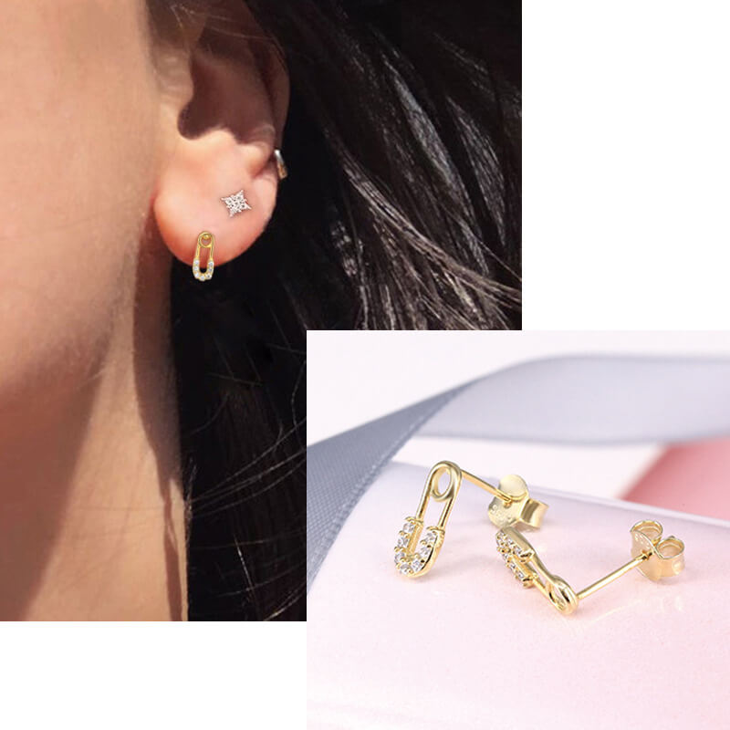 Model wearing gold Safety Pin Stud Earrings